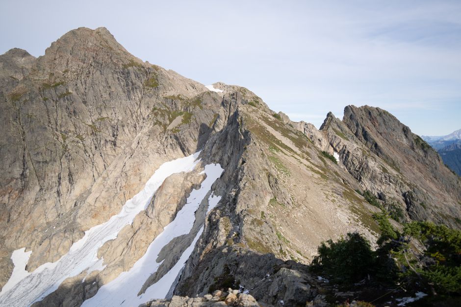 Scenic view of Three Fingers Mountain, Darrington, Washington, showcasing rugged peaks and snow patches.